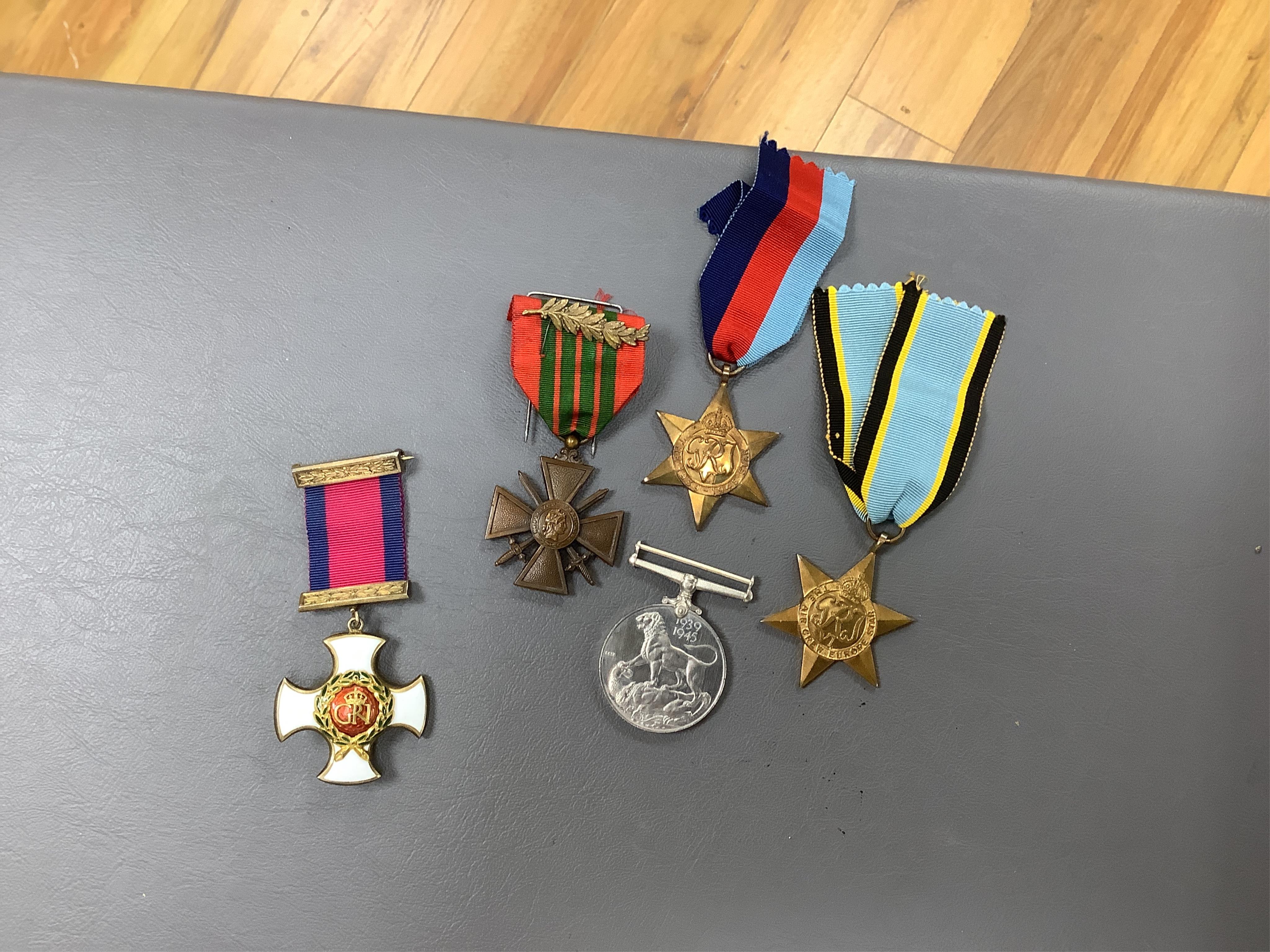 An RAF archive including a WWII DFC medal group awarded to Wing Commander Richard Douglas Speare, comprising; the Distinguished Flying Medal, Air Crew Europe Star, DSO dated 1944, 1939 to 1945 Star, 1939 to 1945 Medal, a